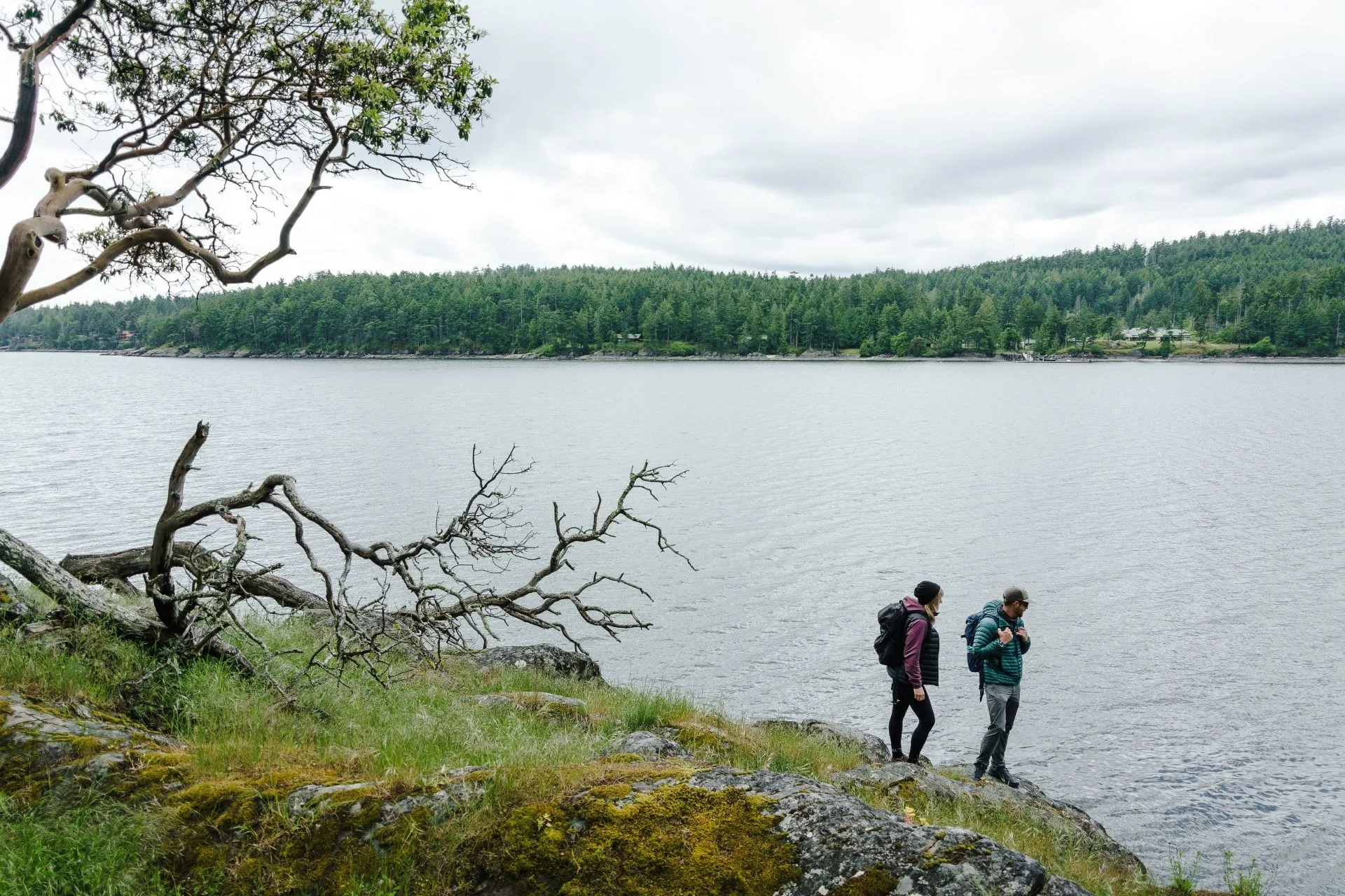 mayne island people hiking along water edge